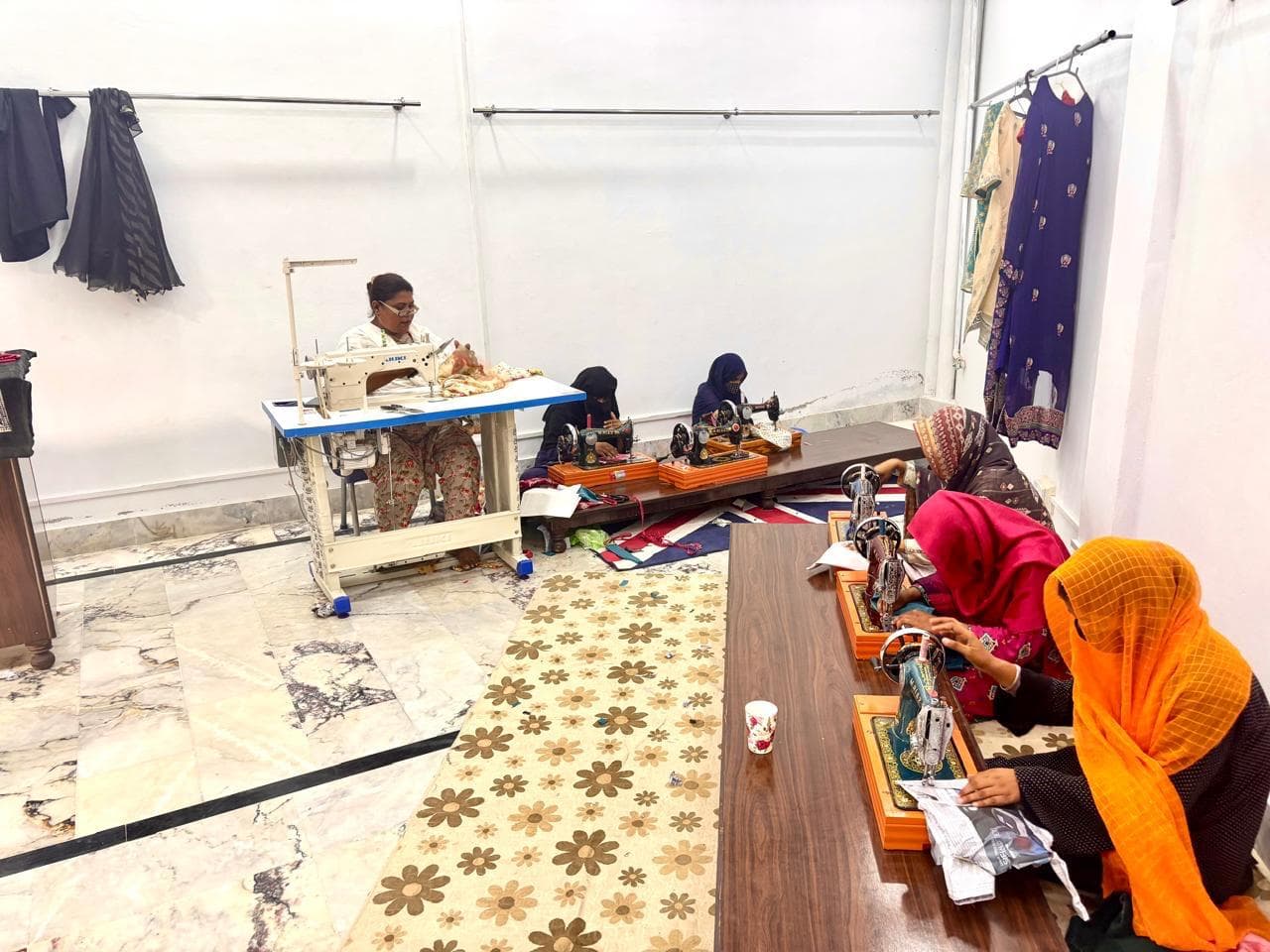 Stitch and Sew Centre sewing class with students using machines